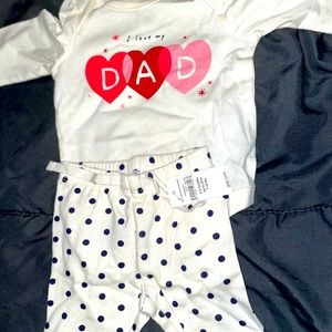 Brand new baby girl 2 piece . Never worn . Tags still attached